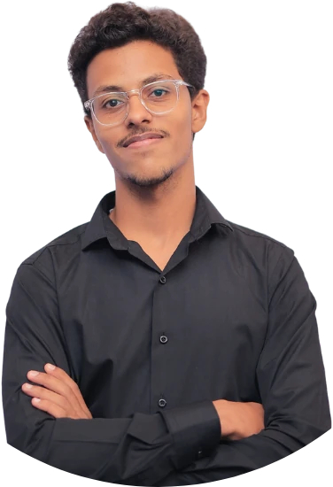 Feras Mamdouh, arms crossed, smiling